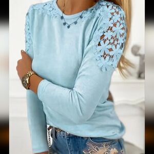 Robin's egg blue long sleeve crew neck 100% cotton tee with lovely lace inserts.